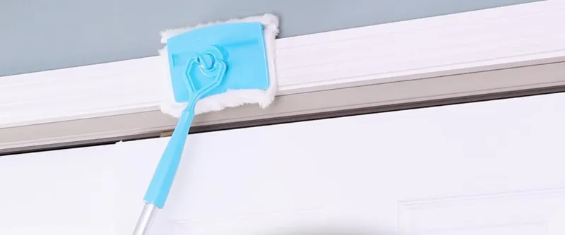 Cleaning head on the moulding above a doorway